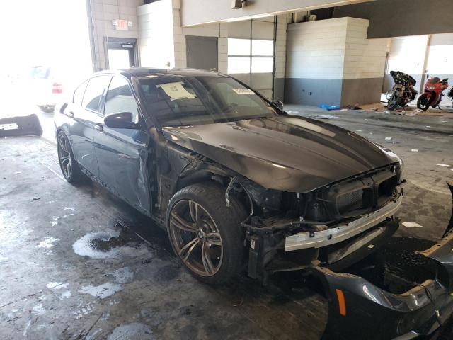 BMW M5 2013 with VIN WBSFV9C57DD095977 - Photo from auction