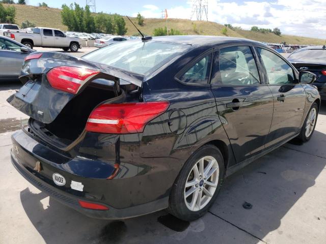 Photo 4 from auction – 2017 FORD FOCUS SE with VIN 1FADP3F27HL284671