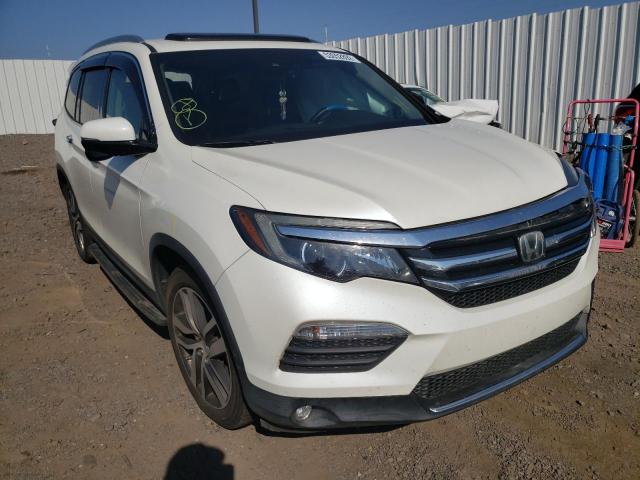 HONDA PILOT TOUR 2016 with VIN 5FNYF5H92GB019730 - Photo from auction