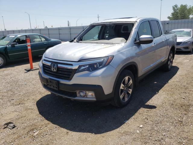 Фото 2 с аукциона – 2017 HONDA RIDGELINE с VIN 5FPYK3F76HB034824