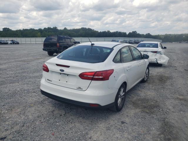 Photo 4 from auction – 2016 FORD FOCUS SE with VIN 1FADP3F29GL338227
