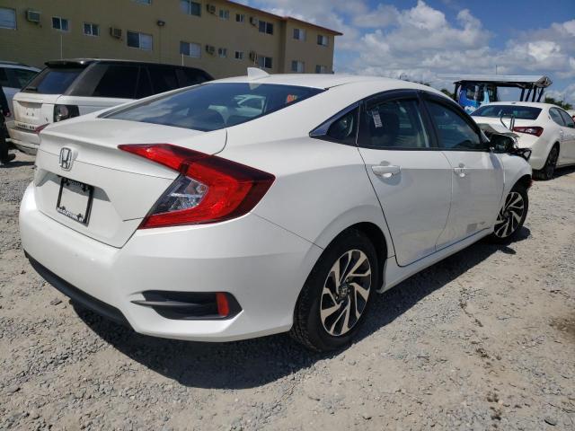 Photo 4 from auction – 2018 HONDA CIVIC EX with VIN 19XFC2F79JE202118
