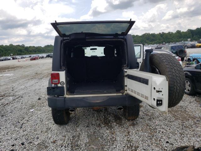 Photo 9 from auction – 2010 JEEP WRANGLER with VIN 1J4BA3H14AL106451