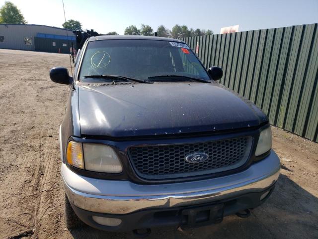 Photo 9 from auction – 2001 FORD F150 with VIN 1FTRX18L31NB38675