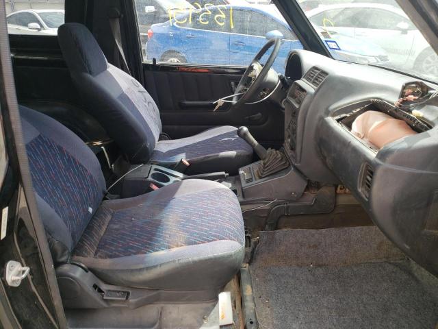 Photo 5 from auction – 1998 CHEVROLET TRACKER with VIN 2CNBE1861W6901690