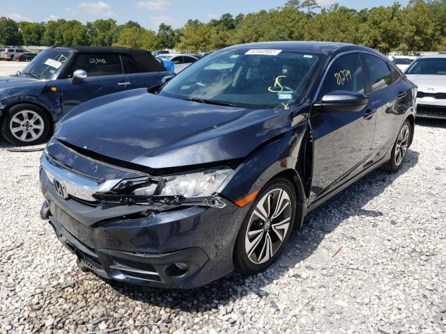 Photo 2 from auction – 2017 HONDA CIVIC EXL with VIN 2HGFC1F73HH650011