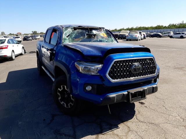 TOYOTA TACOMA DOU 2018 with VIN 3TMCZ5AN0JM149727 - Photo from auction