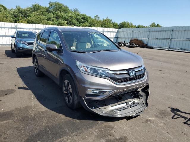 Photo 1 from auction – 2015 HONDA CR-V TOURI with VIN 5J6RM4H97FL040499