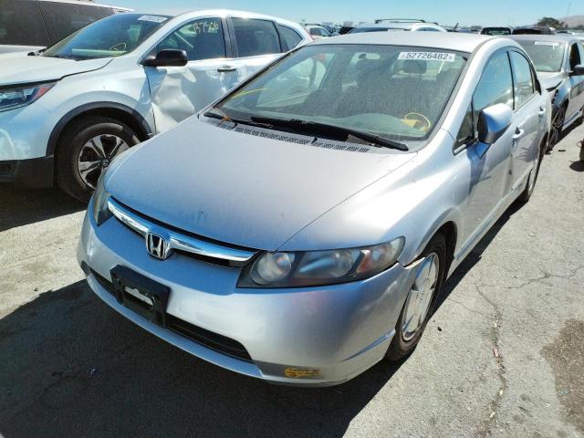 Photo 2 from auction – 2006 HONDA CIVIC HYBR with VIN JHMFA36216S025762