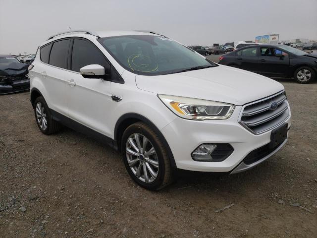 FORD ESCAPE TIT 2017 with VIN 1FMCU0JD5HUC67198 - Photo from auction