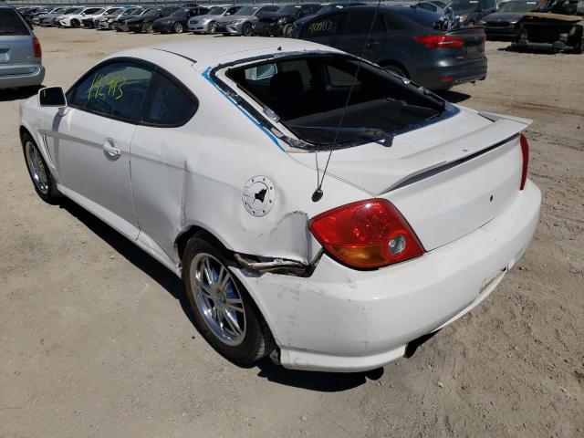 Photo 3 from auction – 2003 HYUNDAI TIBURON with VIN KMHHM65D23U064040