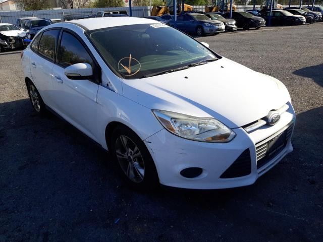 FORD FOCUS SE 2014 with VIN 1FADP3F24EL247881 - Photo from auction