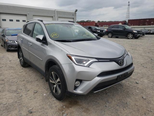 Photo 1 from auction – 2017 TOYOTA RAV4 XLE with VIN 2T3RFREV7HW559650