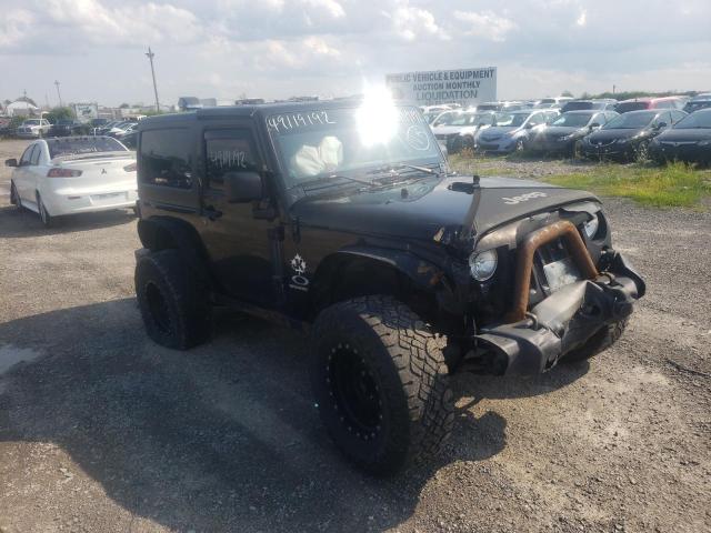 JEEP WRANGLER S 2011 with VIN 1J4AA2D11BL631951 - Photo from auction