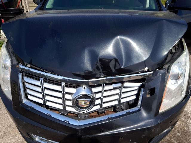 Photo 7 from auction – 2014 CADILLAC SRX PREMIU with VIN 3GYFNGE37ES540270