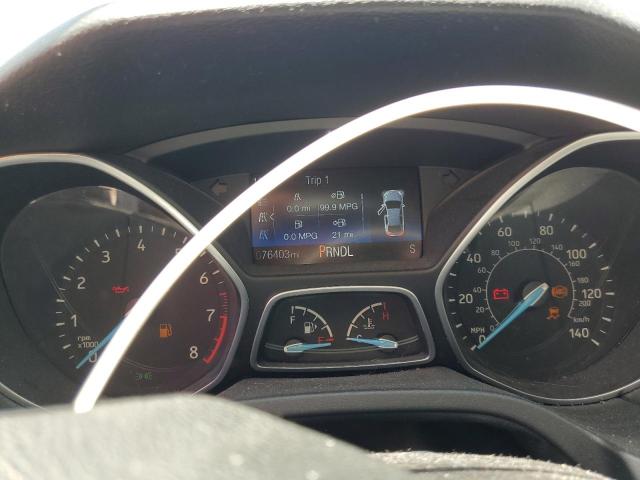 Foto 8 de la subasta – 2015 FORD FOCUS SE con VIN 1FADP3K20FL300972
