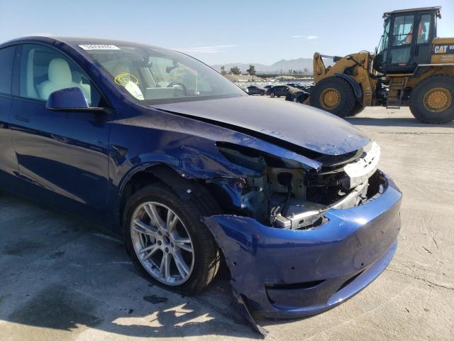 Photo 9 from auction – 2021 TESLA MODEL Y with VIN 5YJYGDED5MF163221