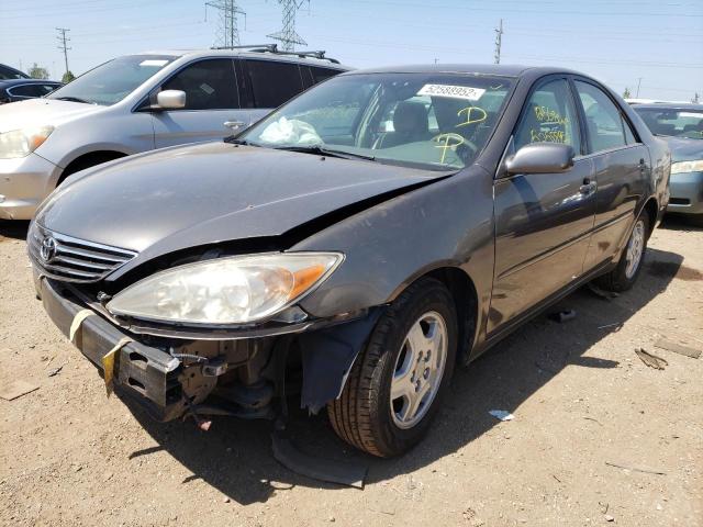 Photo 2 from auction – 2003 TOYOTA CAMRY LE with VIN 4T1BF30K83U565809