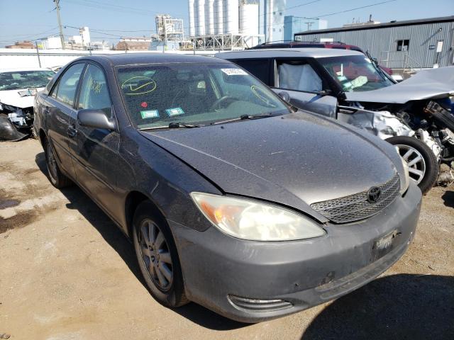 TOYOTA CAMRY LE 2004 with VIN 4T1BE30K64U829503 - Photo from auction