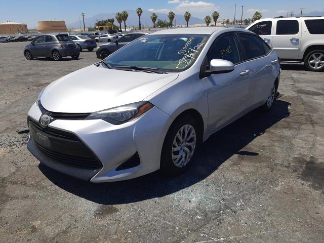Photo 2 from auction – 2017 TOYOTA COROLLA L with VIN 5YFBURHE3HP716023