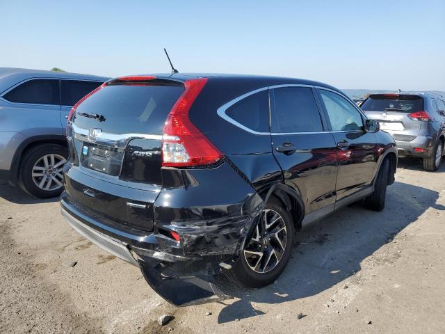Photo 4 from auction – 2016 HONDA CR-V SE with VIN 2HKRM4H48GH663727