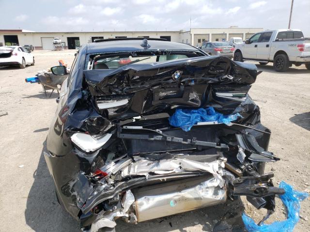 Photo 9 from auction – 2021 BMW 330I with VIN 3MW5R1J03M8C10357