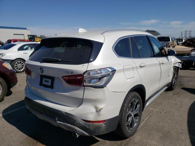 Photo 4 from auction – 2017 BMW X1 XDRIVE2 with VIN WBXHT3C38H5F70012