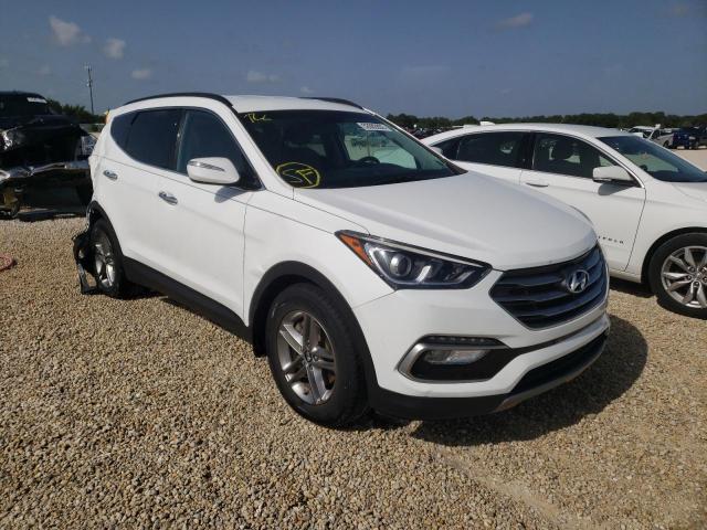 HYUNDAI SANTA FE S 2018 with VIN 5NMZU3LB0JH054958 - Photo from auction