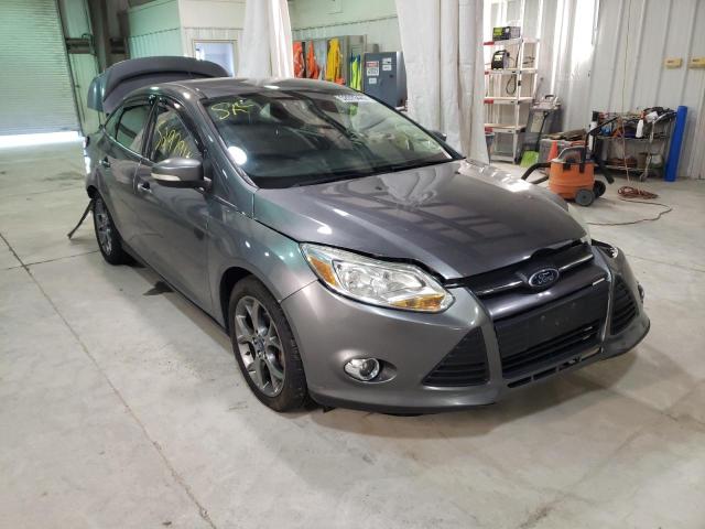 FORD FOCUS SE 2014 with VIN 1FADP3F24EL181848 - Photo from auction
