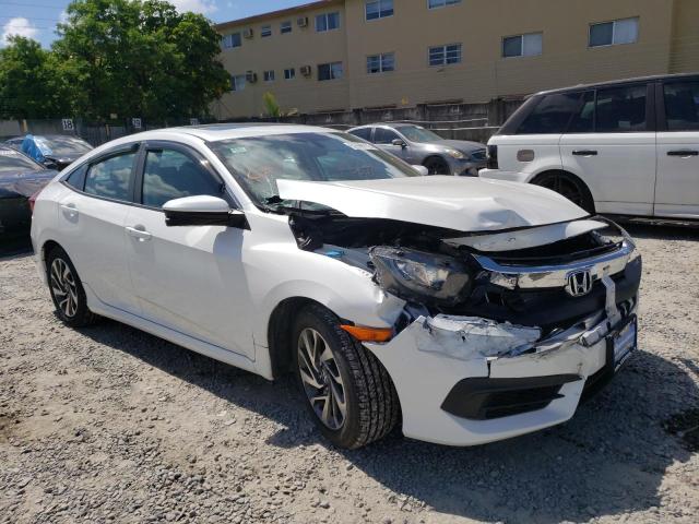 HONDA CIVIC EX 2018 with VIN 19XFC2F79JE202118 - Photo from auction