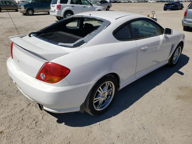 Photo 4 from auction – 2003 HYUNDAI TIBURON with VIN KMHHM65D23U064040