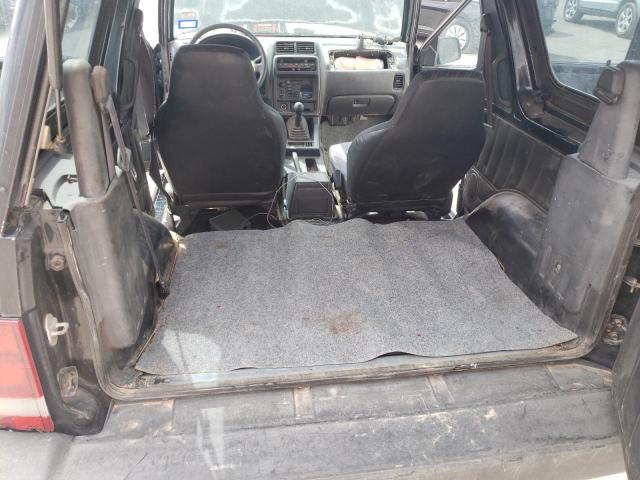Photo 6 from auction – 1998 CHEVROLET TRACKER with VIN 2CNBE1861W6901690