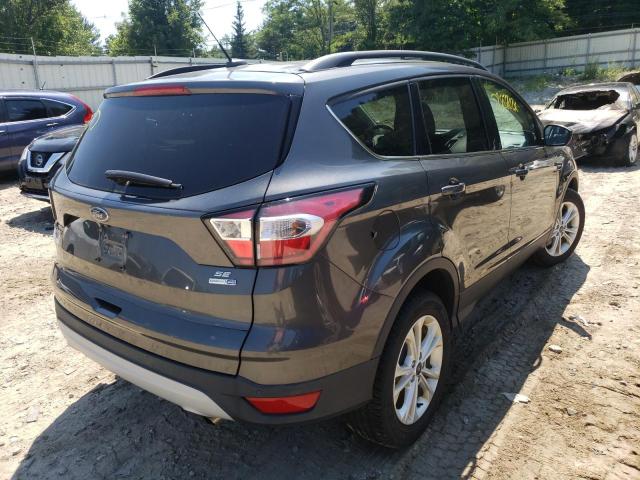 Photo 4 from auction – 2017 FORD ESCAPE SE with VIN 1FMCU9GD8HUC12577