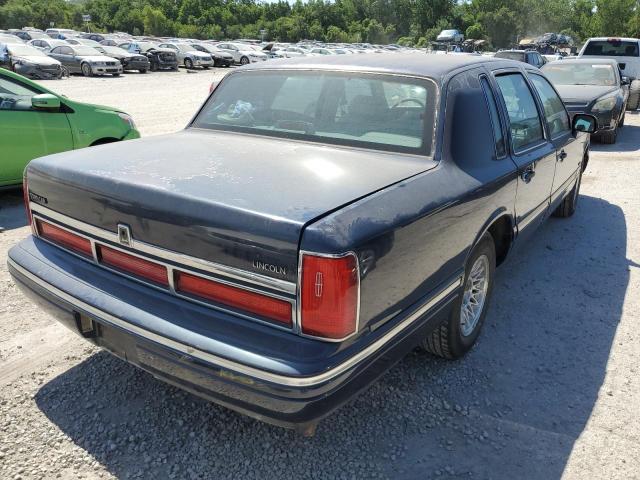 Photo 4 from auction – 1997 LINCOLN TOWN CAR E with VIN 1LNLM81W3VY744618