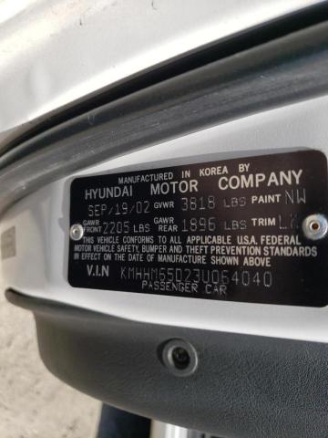 Photo 10 from auction – 2003 HYUNDAI TIBURON with VIN KMHHM65D23U064040