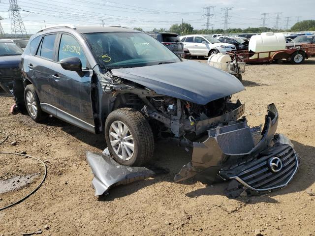 MAZDA CX-5 TOURI 2016 with VIN JM3KE2CY5G0801421 - Photo from auction