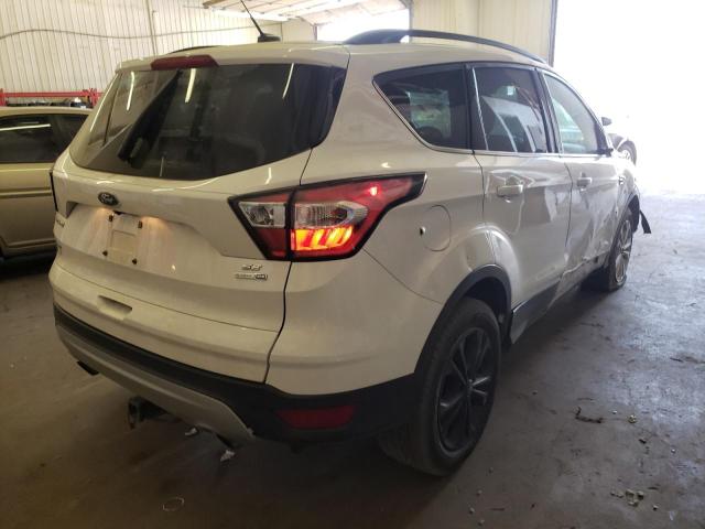 Photo 4 from auction – 2018 FORD ESCAPE SE with VIN 1FMCU9GD5JUA23620