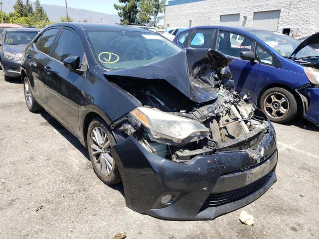 TOYOTA COROLLA L 2015 with VIN 5YFBURHE9FP355281 - Photo from auction