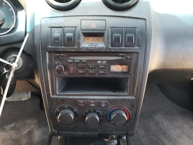 Photo 9 from auction – 2003 HYUNDAI TIBURON with VIN KMHHM65D23U064040