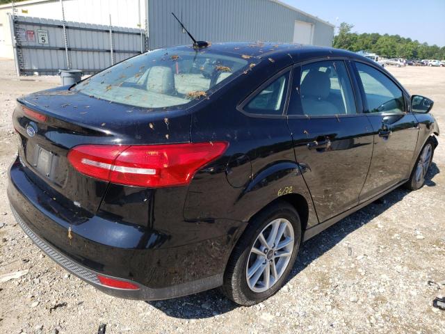 Photo 4 from auction – 2017 FORD FOCUS SE with VIN 1FADP3F25HL293983