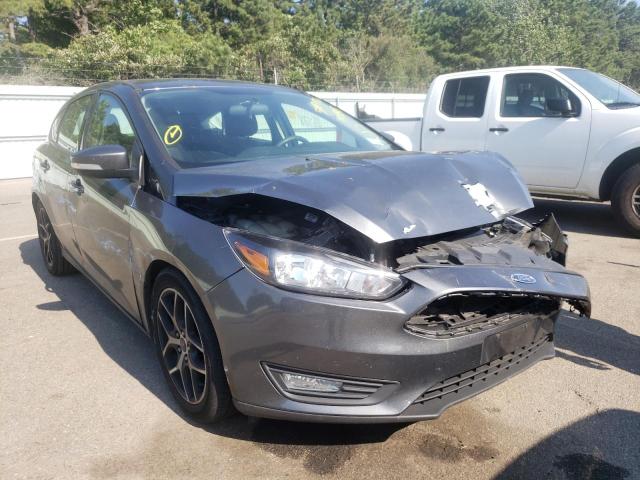 FORD FOCUS SEL 2018 with VIN 1FADP3M23JL213945 - Photo from auction
