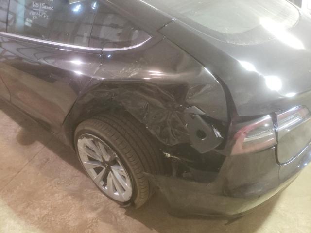 Photo 9 from auction – 2022 TESLA MODEL 3 with VIN 5YJ3E1EB1NF191659
