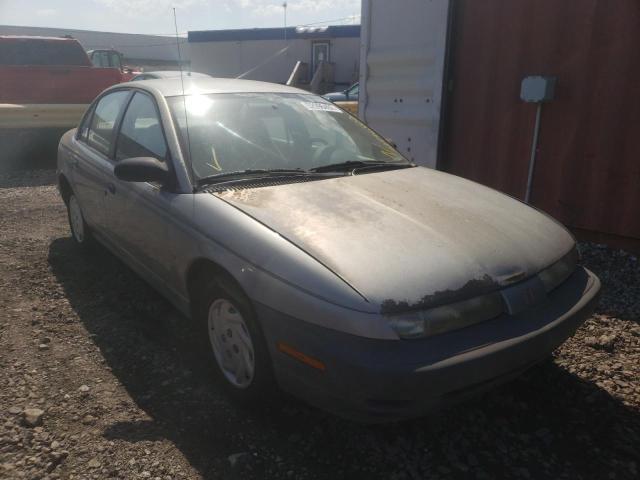 SATURN SL 1999 with VIN 1G8ZF5281XZ178599 - Photo from auction