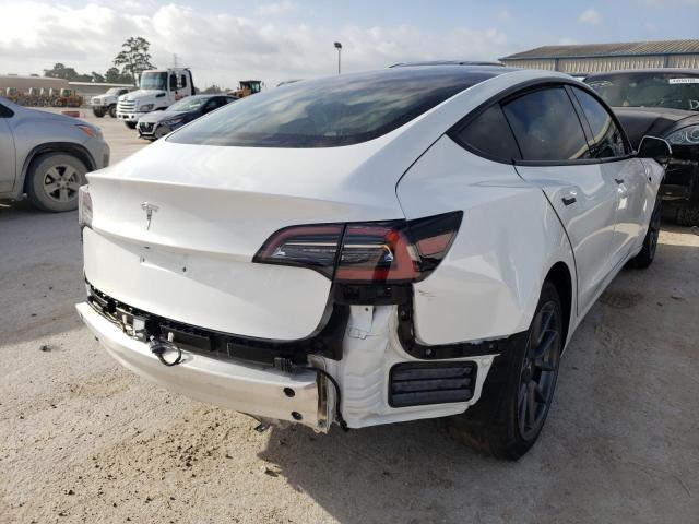 Photo 4 from auction – 2021 TESLA MODEL 3 with VIN 5YJ3E1EA9MF861495