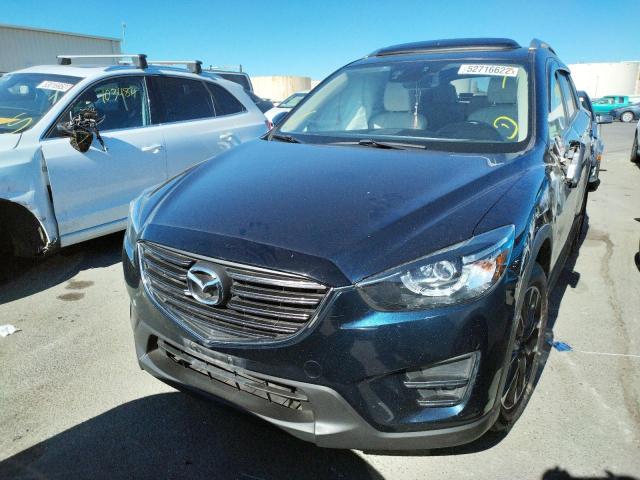 Photo 2 from auction – 2016 MAZDA CX-5 GT with VIN JM3KE4DYXG0884273