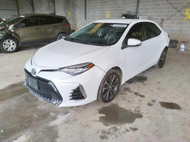 Photo 2 from auction – 2018 TOYOTA COROLLA L with VIN 5YFBURHE9JP779939