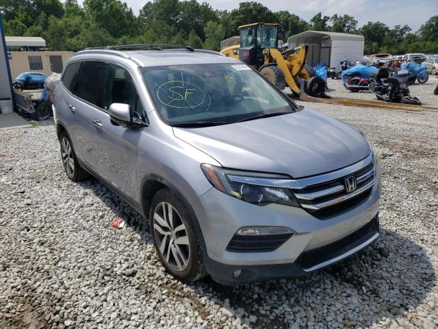 HONDA PILOT TOUR 2016 with VIN 5FNYF5H97GB025328 - Photo from auction