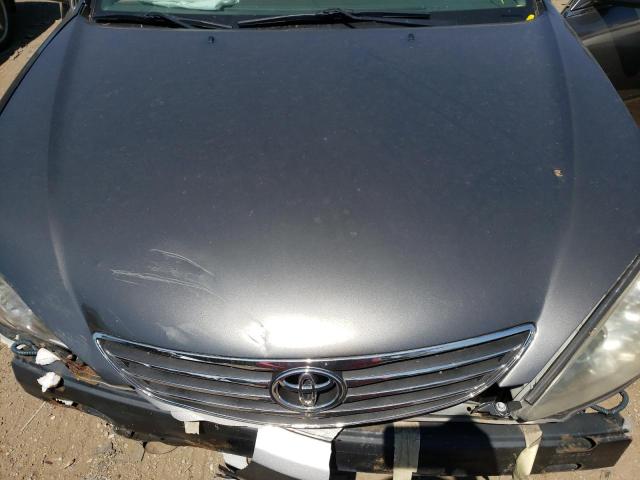 Photo 7 from auction – 2003 TOYOTA CAMRY LE with VIN 4T1BF30K83U565809