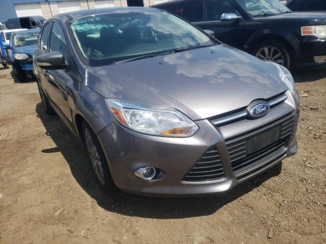 FORD FOCUS SE 2014 with VIN 1FADP3K21EL160977 - Photo from auction