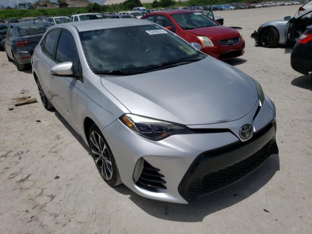 TOYOTA COROLLA L 2017 with VIN 5YFBURHE0HP590350 - Photo from auction